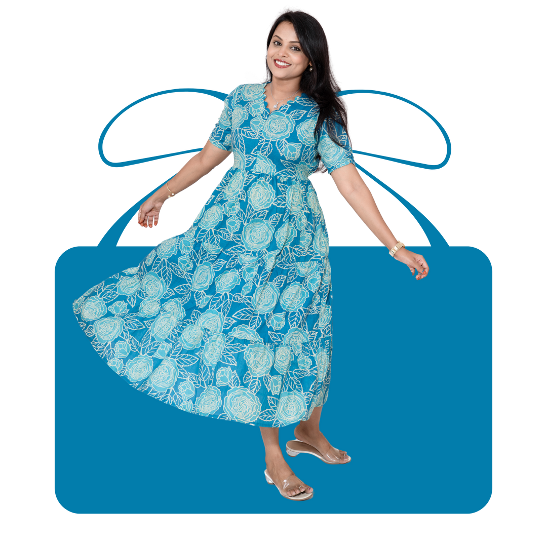 Woman wearing blue flower day to night dress with puff sleeves and center zipper, designed for maternity and nursing.