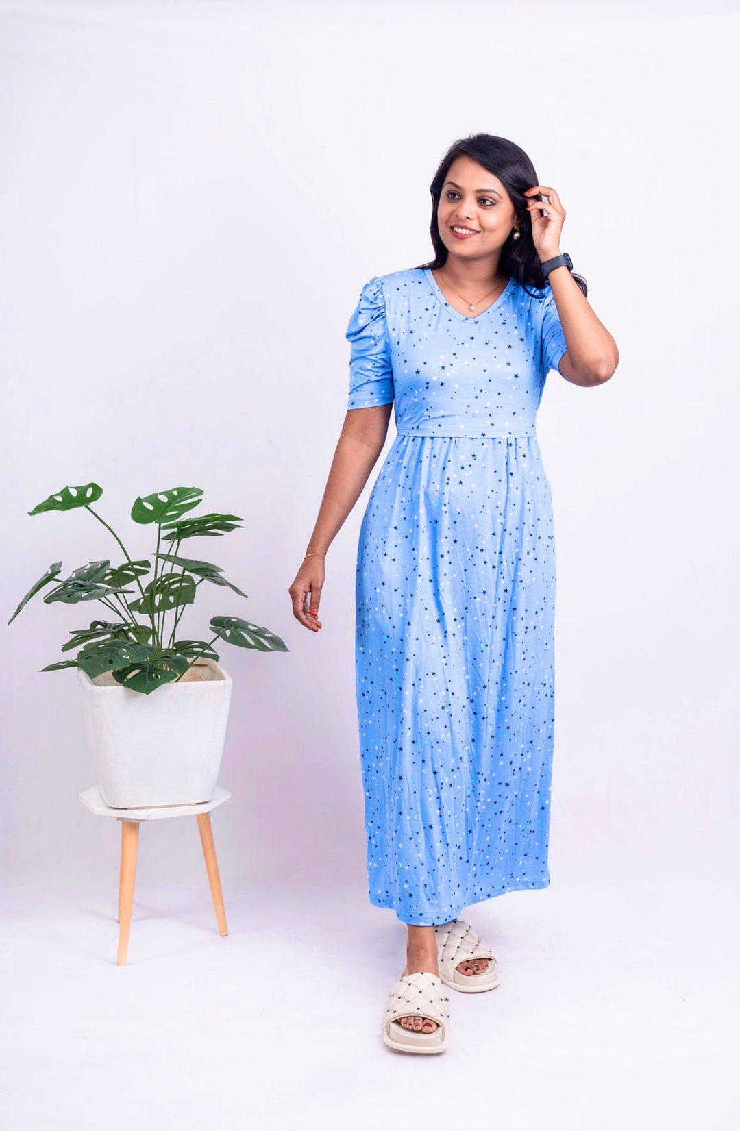 Blue maxi nursing dress with star print, V-neck, puff elbow sleeves, and flap for easy nursing access