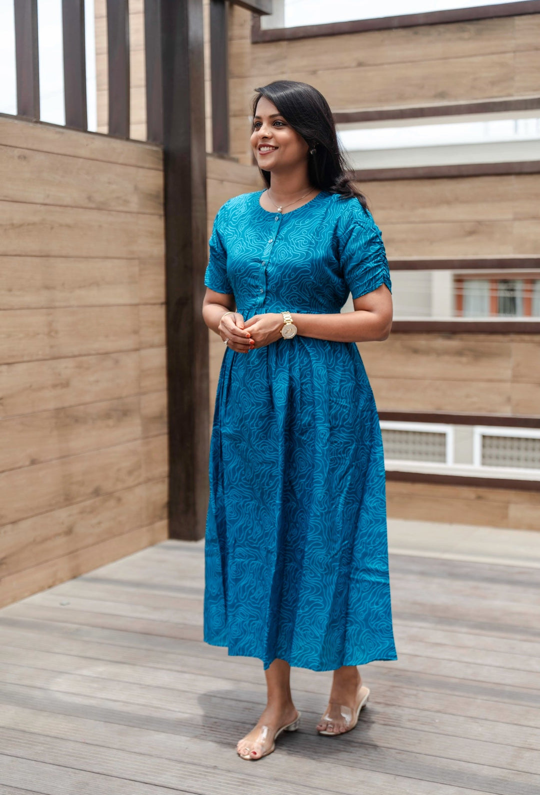 Blue cotton blend day to night dress with center button opening, round neck, and fish cut sleeves, suitable for maternity and nursing.