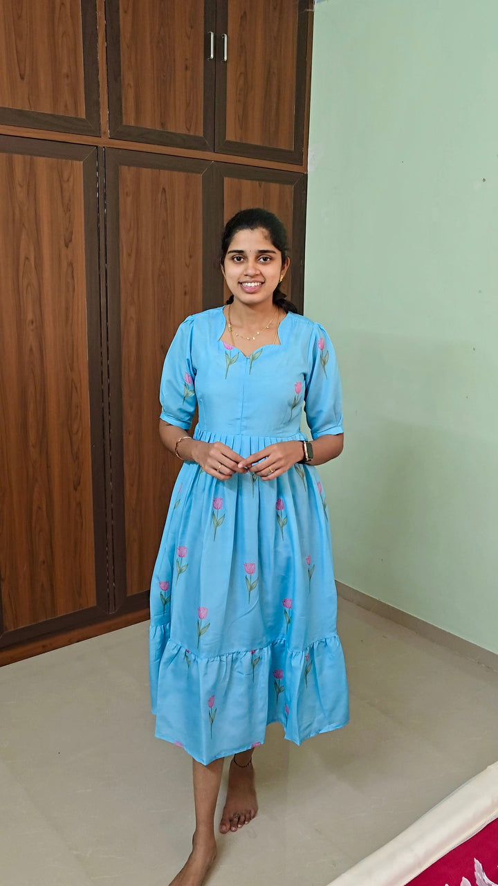 Skyblue cotton blend day to night dress with floral print, elbow sleeves, and center zip for maternity and nursing.