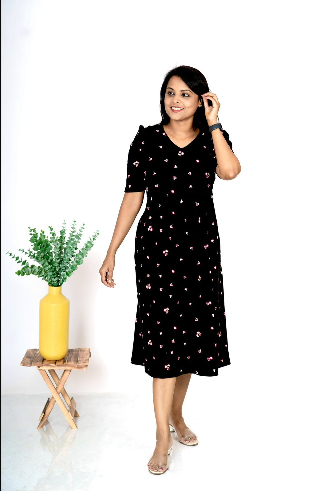 Midi Black Titan Ribbed cotton nursing dress with floral print and V-neck, featuring puff elbow sleeves and nursing flap.