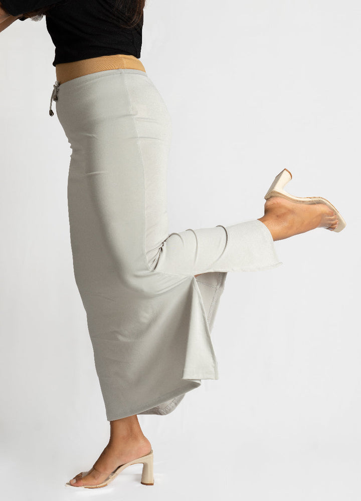 Silver light grey Samaya Sareeshaper with drawstring waist and heavy flare bottom, designed for comfort and durability under sarees and dresses.