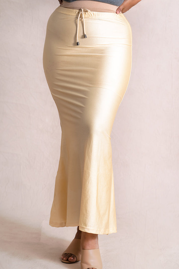 Cream Buttersoft Shimmer Sareeshaper with drawstring waist and smooth, stretchy fabric designed for comfort and durability.