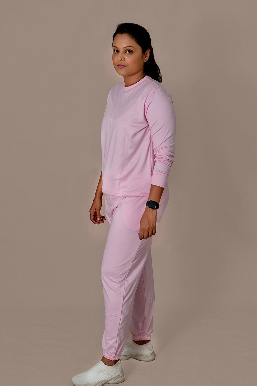 Woman wearing bubblegum pink everyday cozy winter set with relaxed fit and two pockets